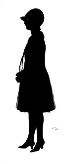 Silhouette of woman in cloche hat