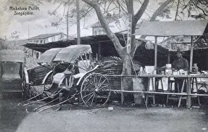 Rickshaws Prints: Singapore - Rickshaw puller takes a breather