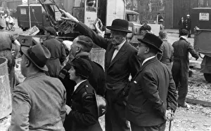 Sir Ernest Gowers watching rescue operations, WW2