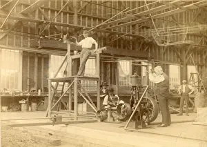 Sir Hiram Maxim operating the valve of the steam engine? Sir Hiram Maxim operating the valve of the steam engine?