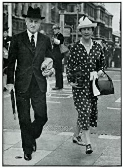 Sir Hoare and his wife carrying gas masks, September 1939