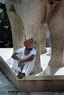 Images Dated 5th September 2019: Sitting on a statue of an elephant, Jaipur, Rajasthan, India