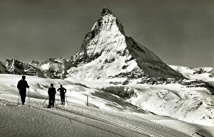 Iconic Collection: Skiers and the Matterhorn (Mont Cervin), Switzerland