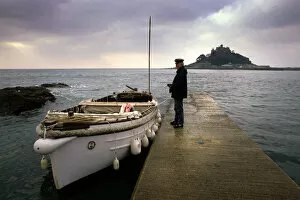 Skipper Collection: The skipper of a small ferry boat, Marazion, Cornwall