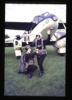 Two sky divers preparing for a jump