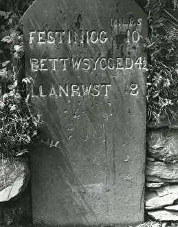 Slate milestone near Penmachno, North Wales