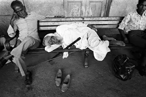 Junction Prints: Sleeping man Varanasi Junction railway