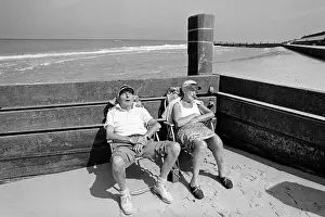 Norfolk Prints: Sleeping pensioners, Norfolk beach
