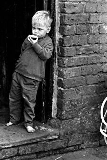 Slum child eating