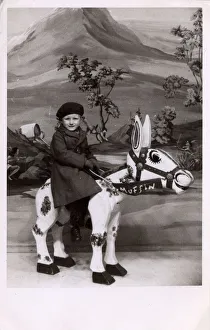 Small boy - Studio photograph - riding Muffin the Mule Model Small boy - Studio photograph - riding Muffin the Mule Model