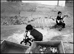 Images Dated 30th August 2016: Small boys playing in the street, Malaga, Spain