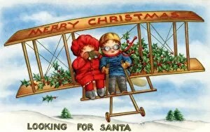 Images Dated 28th September 2012: Two small children take to the air in search of Santa