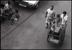 Small family with handcart, Valencia, Spain