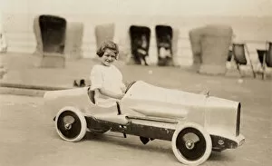 Child Hood Gallery: Small girl in a pedal car