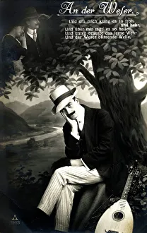 Smart Gent sits beneath a tree and thinks of his love