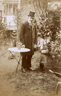 Well Dressed Prints: Smart Gentleman and young daughter in garden