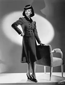 Smart two-piece suit designed by Dolly Tree for Lana Turner