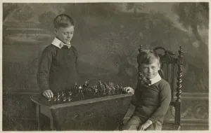 Images Dated 18th May 2020: Two smart young boys play with their model tin soldiers