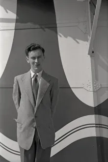 Images Dated 7th January 2020: Smartly-dressed young man - patterned backdrop
