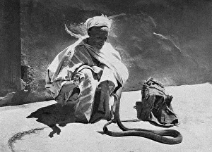 Images Dated 4th December 2017: Snake Charmer in the Souks, Marrakesh, Morocco