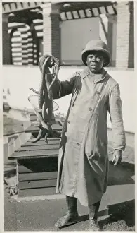 Overcoat Prints: Snake Charmer - South Africa Date: circa 1920s