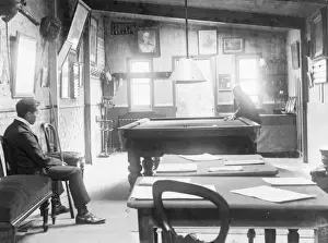 Snooker room with two players