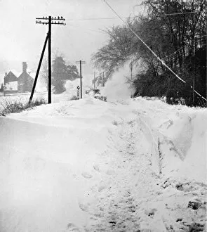 Blizzard Collection: Snow blocked road in Kent, 1963