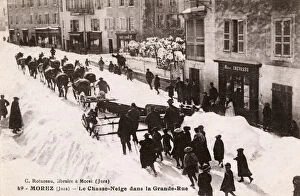 Snowplough clearing the Grande Rue at Morez, France