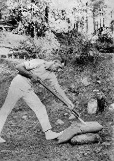 Soldier with bayoneted rifle, India