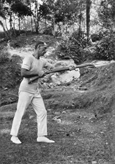 Soldier with bayoneted rifle, India