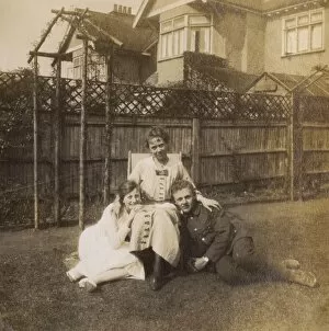 Images Dated 10th February 2017: Soldier with fiancee and her mother in a garden, WW1