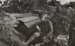 Images Dated 10th February 2017: Soldier sitting by a dugout, Northern France, WW1