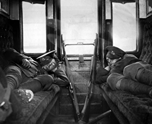 Images Dated 2nd February 2012: Soldiers asleep in railway carriage during rail strike