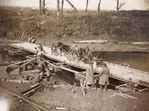Images Dated 26th August 2011: Soldiers building pontoon bridge, Flanders, WW1