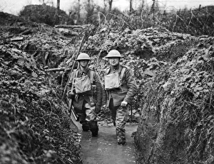 Muddy Gallery: Two soldiers in flooded trench, Western Front, WW1