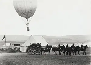 Soldiers on Horses and a Horse Drawn Carriage with a Tet?