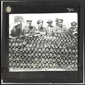 Images Dated 10th October 2012: Soldiers lean on pile of 18-pounder shells nr Becourt Wood