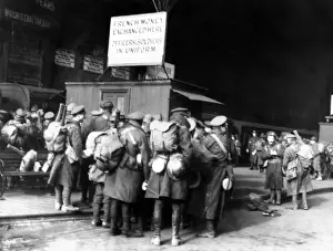 Exchanging Prints: Soldiers on leave at a railway station, WW1