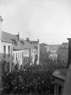 Soldiers march up High Street, Haverfordwest, South Wales
