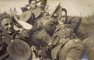 Auerbach Collection: Soldiers of Royal Fusiliers relaxing during route march, WW1
