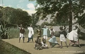 Somali boys practicing spear throwing