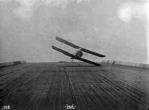 A Sopwith Pup with early arrester gear during deck-landing