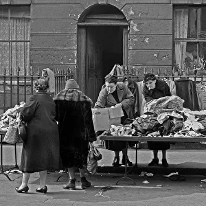 Piles Gallery: Sorting through old clothes in Londons East End
