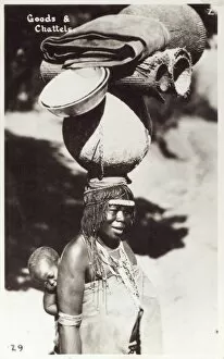 Images Dated 27th April 2011: South African woman carrying goods on her head