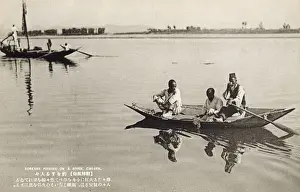South Korea - Three men fishing on the River in Joseon