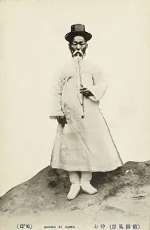 Smoker Prints: South Korea - A Shinshi smoking a long-stemmed pipe