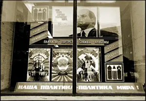 Lenin Prints: Soviet-era posters displayed in a window - Moscow