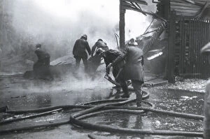 Barcelonese Collection: Spanish Civil War. Firemen and members of