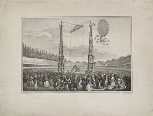Spectators in an arena viewing the ascension of a balloon dr