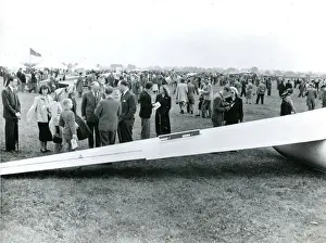 Spectators in front of the wing of a Sky Sailplane at th?